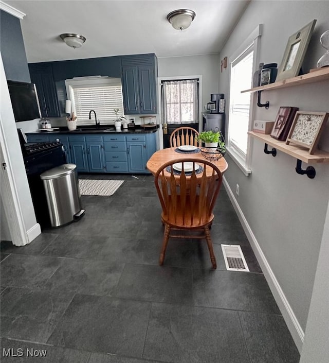 dining space with sink