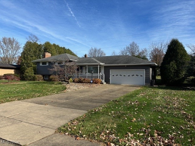 view of front of home featuring a garage, a porch, and a front yard