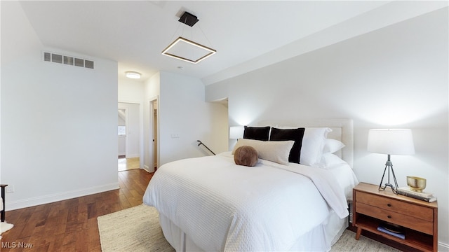 bedroom featuring hardwood / wood-style flooring