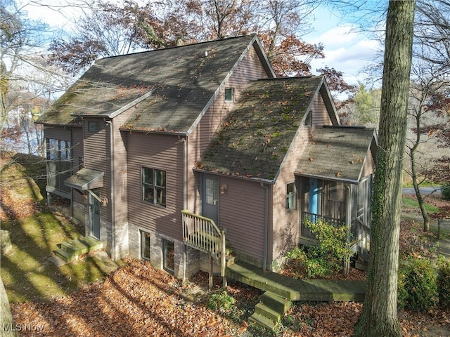 view of home's exterior featuring a balcony