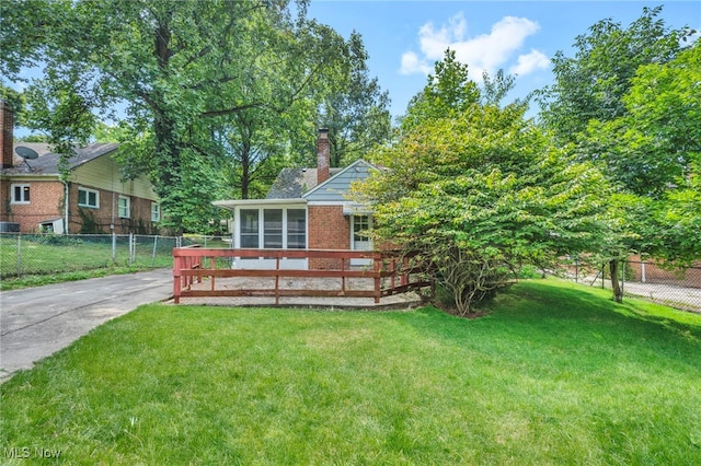 exterior space with a front lawn