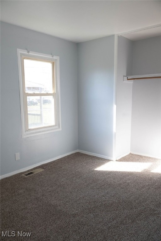 unfurnished bedroom featuring carpet floors