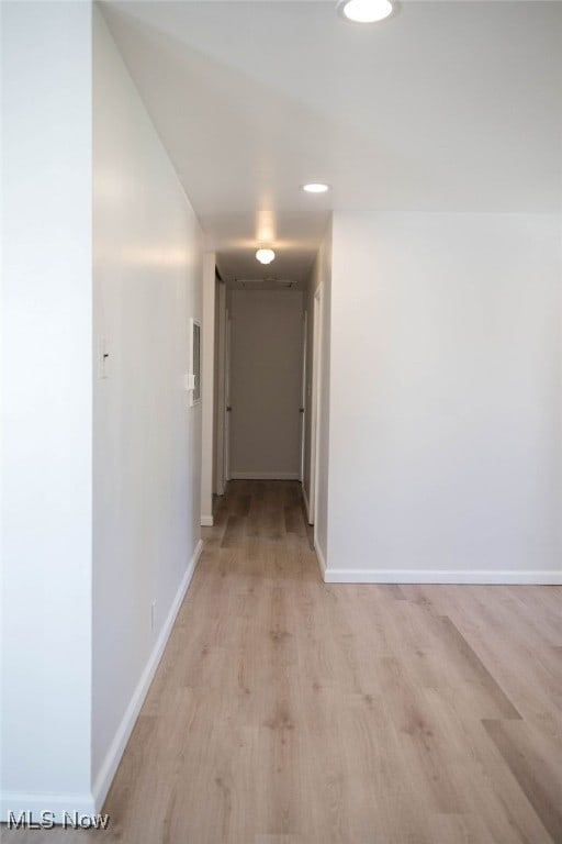 corridor featuring light wood-type flooring