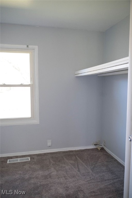 spare room with carpet flooring