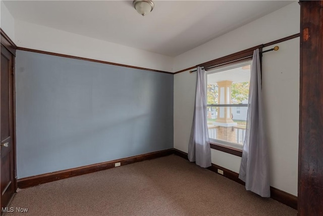 3594 W 49th St, Cleveland, OH 44102 - empty room with carpet flooring and baseboards