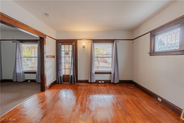 3594 W 49th St, Cleveland, OH 44102 - empty room with light wood-type flooring, baseboards, and a smoke detector