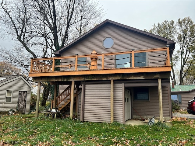 back of property featuring a wooden deck