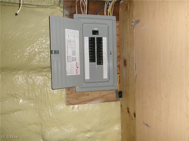 utility room featuring electric panel