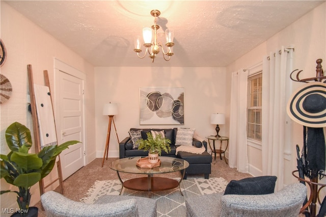 carpeted living room with a textured ceiling and an inviting chandelier