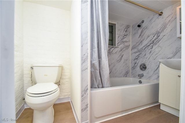 bathroom featuring toilet and shower / bath combo with shower curtain