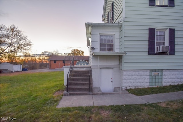 exterior space with a lawn