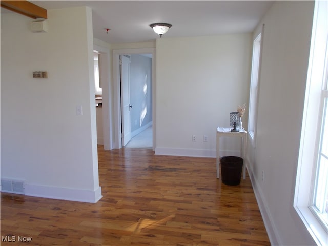 hallway featuring dark wood-type flooring