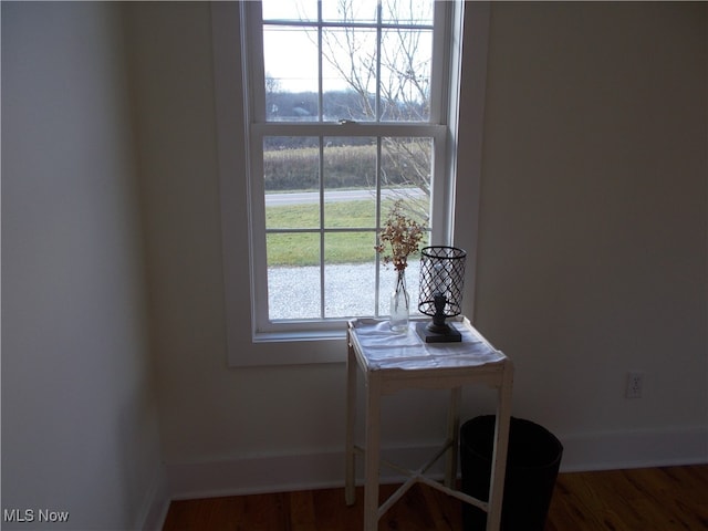 office space with dark wood-type flooring and a wealth of natural light