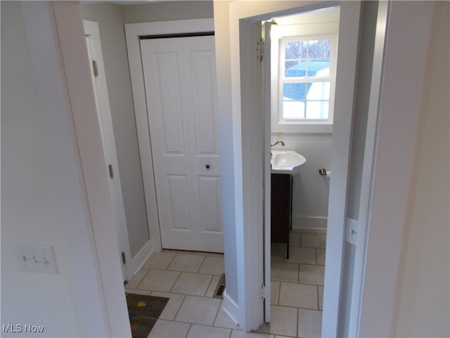 bathroom featuring vanity and tile patterned flooring