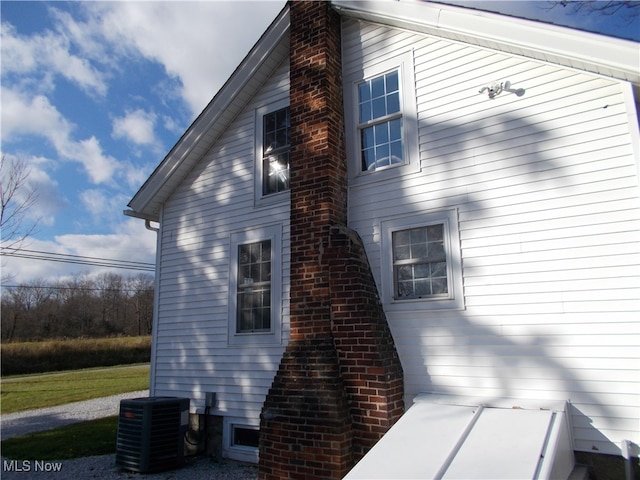 view of home's exterior with central air condition unit