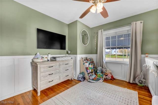 interior space with ceiling fan and light wood-type flooring