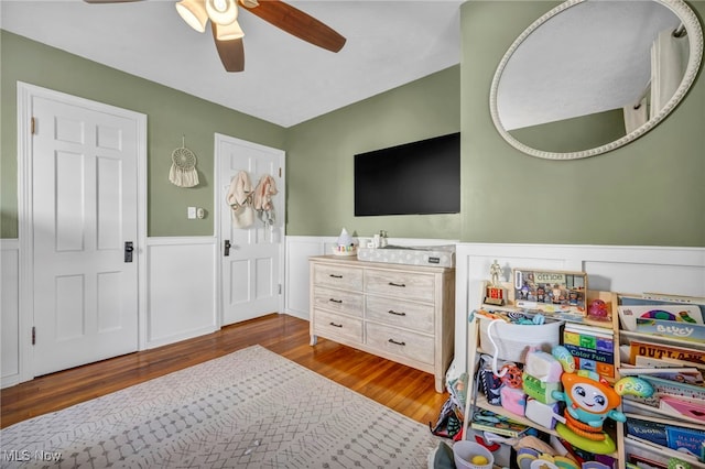 bedroom featuring ceiling fan and hardwood / wood-style floors