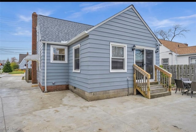 rear view of house featuring a patio area