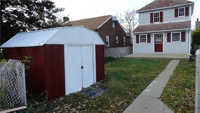 view of outdoor structure with a lawn