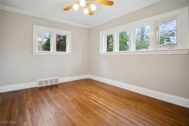 unfurnished room featuring hardwood / wood-style floors and plenty of natural light