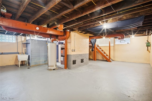 basement with sink and gas water heater