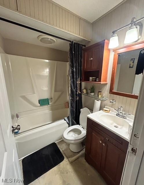 full bathroom featuring vanity, toilet, and shower / tub combo with curtain