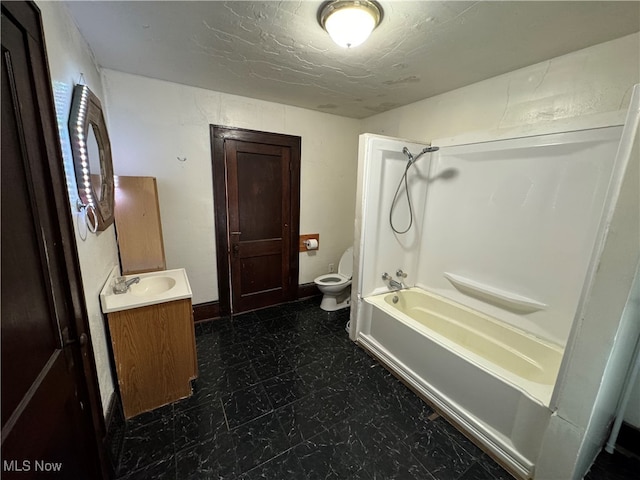 full bathroom featuring toilet, vanity, shower / bath combination, and a textured ceiling