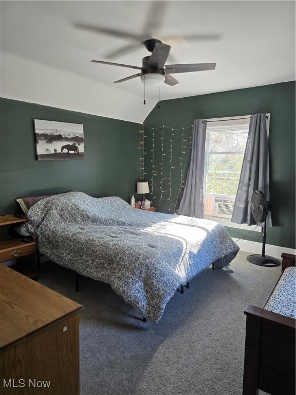 carpeted bedroom featuring ceiling fan