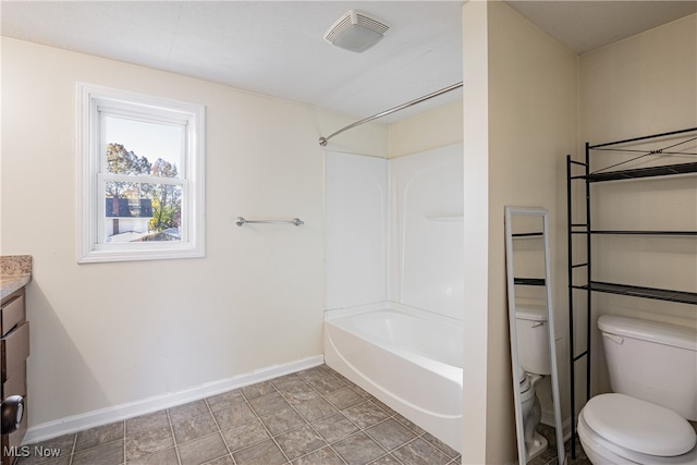 full bathroom with toilet, vanity, and shower / washtub combination