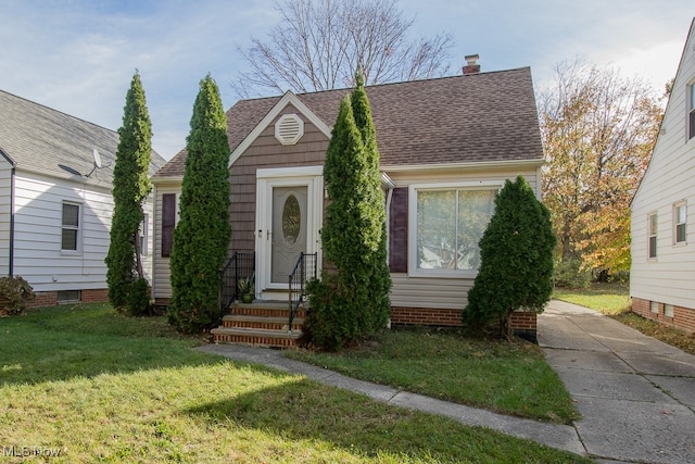 view of front of property with a front yard