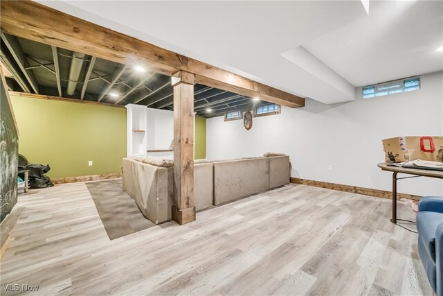 basement featuring hardwood / wood-style floors