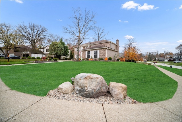 view of property exterior featuring a lawn