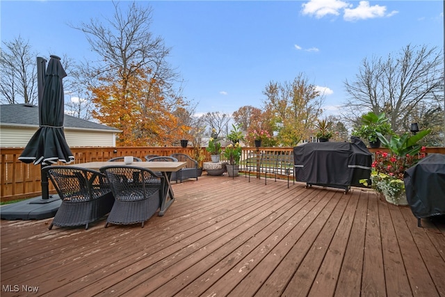 deck featuring a grill