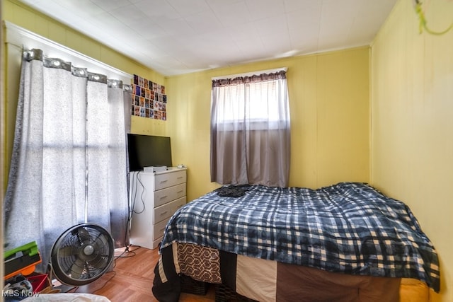 bedroom with parquet floors