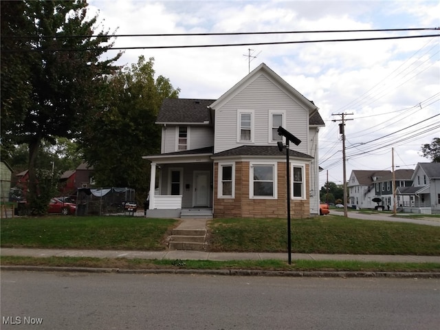 view of front of home with a front yard