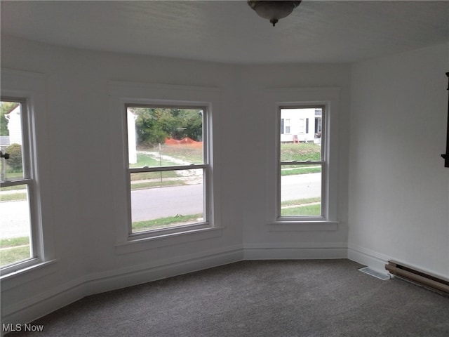 view of carpeted spare room