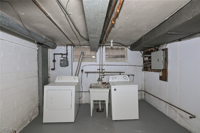 washroom featuring separate washer and dryer and electric panel