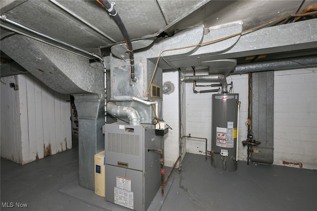 utility room featuring water heater