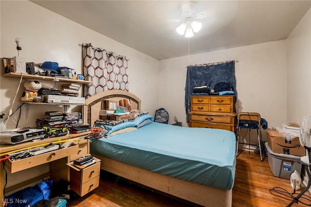 bedroom featuring hardwood / wood-style floors