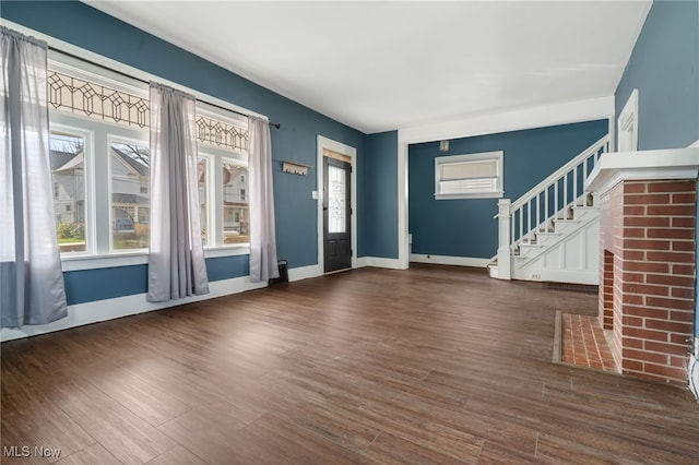 foyer with dark wood-type flooring