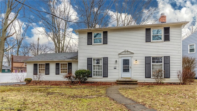 colonial house with a front lawn