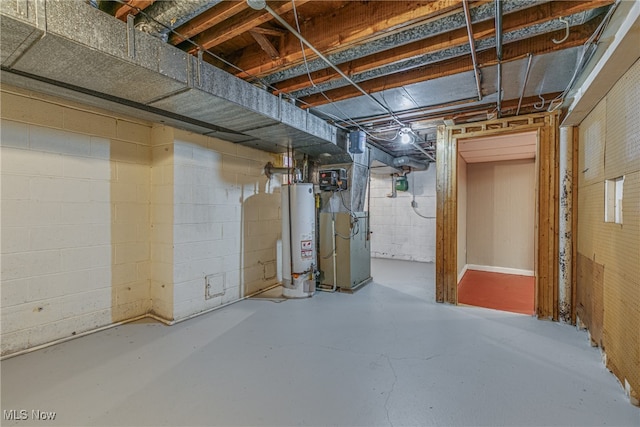 basement featuring gas water heater and heating unit