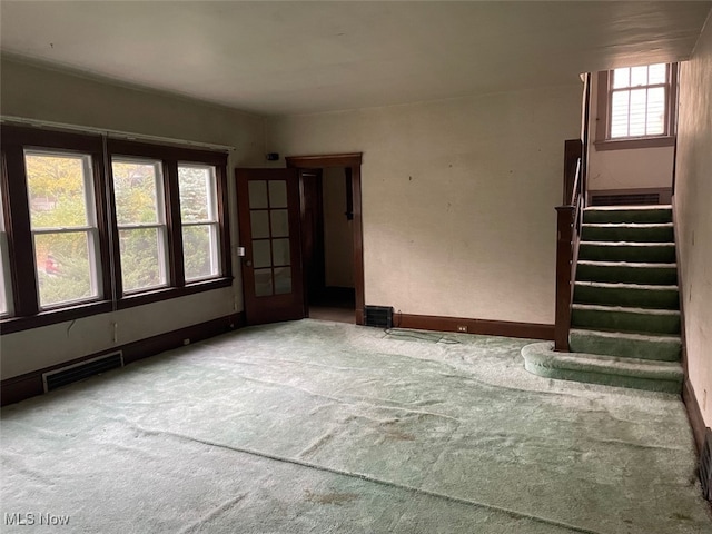 unfurnished room featuring carpet flooring