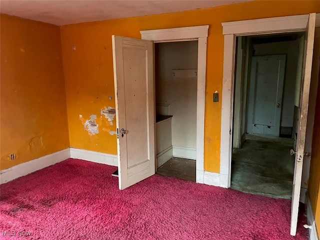 unfurnished bedroom featuring carpet