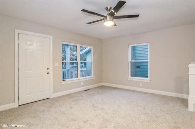 1064 Bryce Ave, Aurora, OH 44202 - spare room with carpet floors, baseboards, and a ceiling fan