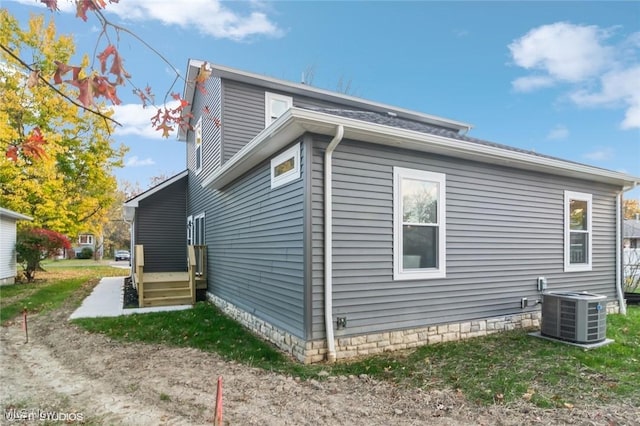 1064 Bryce Ave, Aurora, OH 44202 - view of side of property featuring central AC