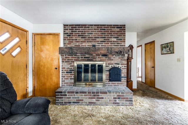 carpeted living room featuring a fireplace