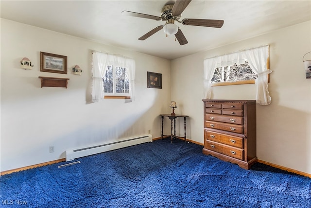 unfurnished bedroom featuring a baseboard radiator, carpet floors, and ceiling fan