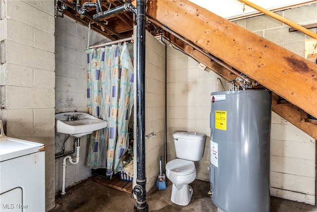 bathroom featuring sink, concrete flooring, washer / dryer, water heater, and toilet