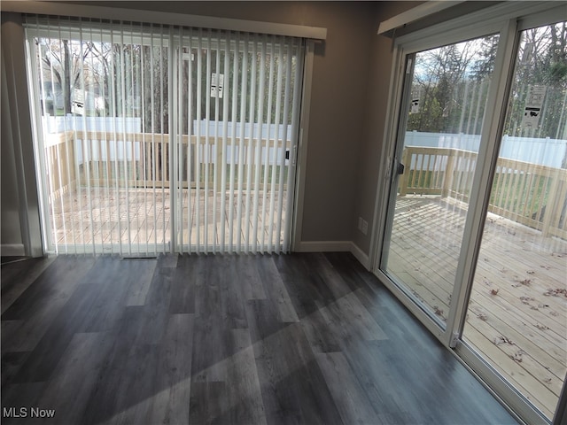 doorway featuring dark hardwood / wood-style flooring